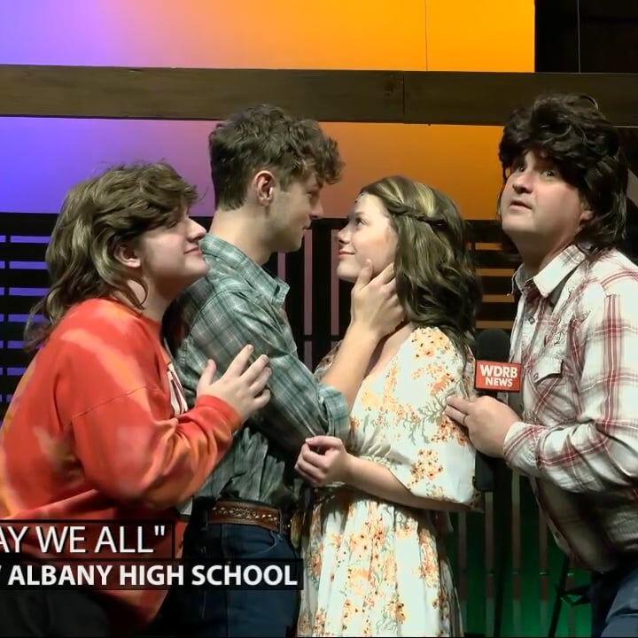 Keith Kaiser poses for a family photo with the cast of 'May We All'
